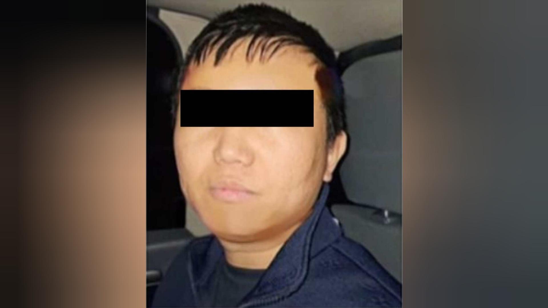 Detiene a Zhi Dong Zhang