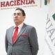 Funcionarios de la Agencia Nacional de Aduanas de México realizan una revisión aduanera en un punto de control fronterizo.